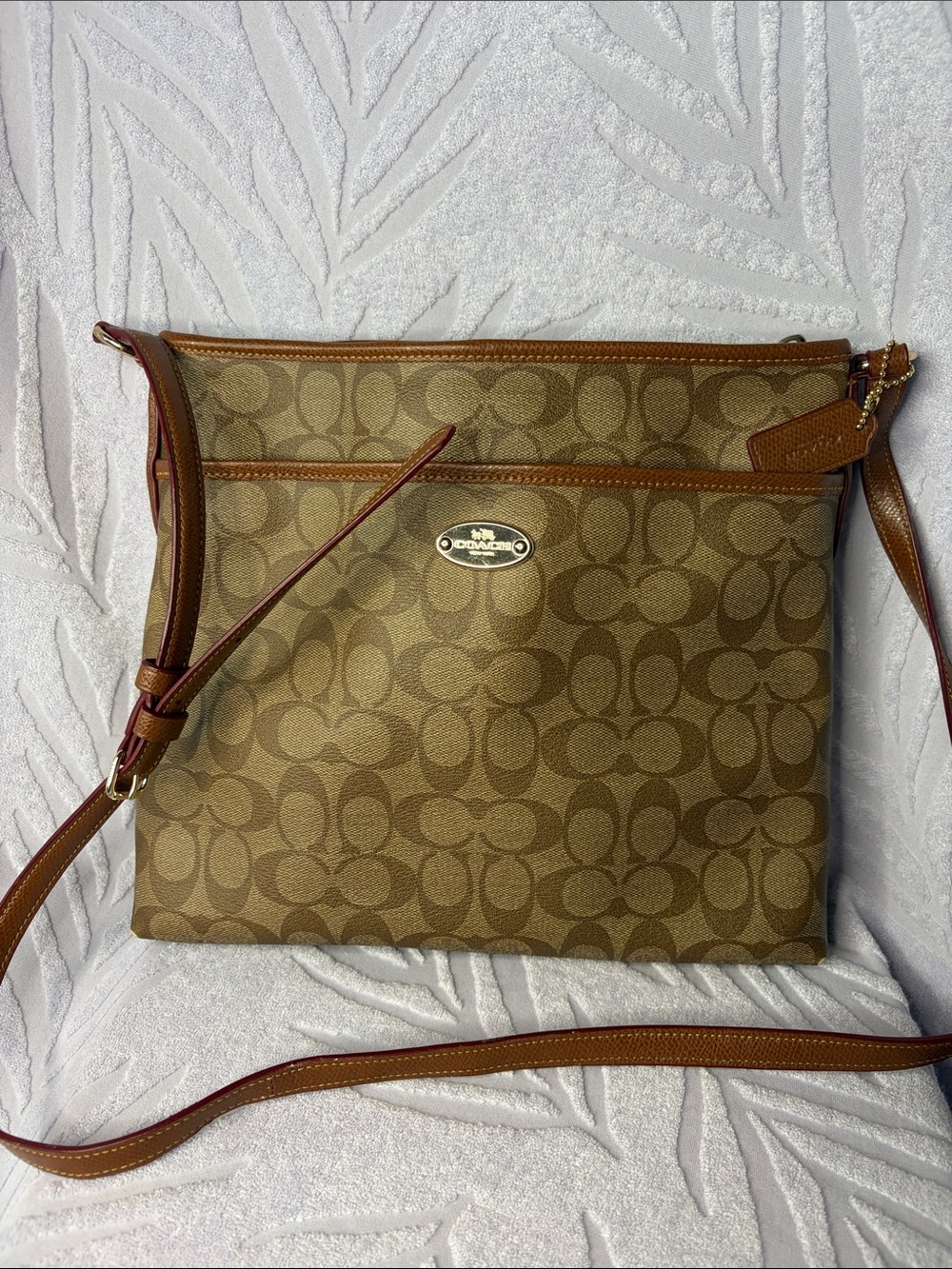 Coach  Signature coated canvas Crossbody Bag in Brown